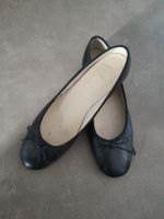 Schwarze Ballerinas