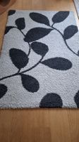 Teppich mit Blumenmuster, Beige/Schwarz Grösse 120 x 170 cm