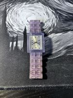 Montre Swatch lilac peu portée !