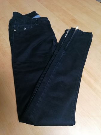 Jean noir élégant avec fermetures éclairs