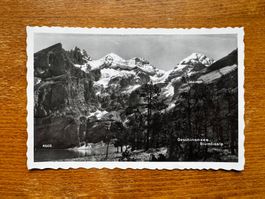 Alte Ansichtskarte vom Oeschinensee mit Blümlisalp gelaufen
