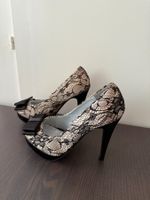 38. Escarpins hauts en dentelle