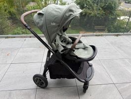 Joie Versatrax Signature vert – Trio complet + i-Snug + base