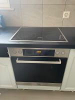 four Miele avec 4 plaques de cuisson vitrocéramiques