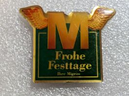 Ansteckpin 244: Migros Frohe Festtage