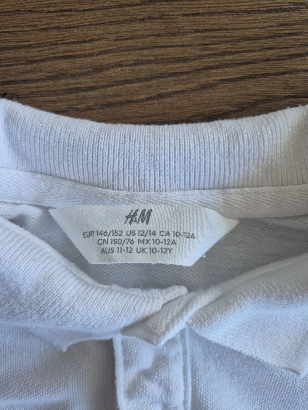 H&M Camicie, T-shirt & Polo: Polo H&M weiss Grösse 146/152  – Nuovo (secondo la descrizione) da Unterägeri venduto da Idecurtins 1