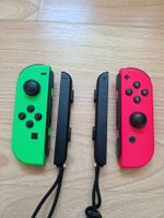 2x Nintendo Switch Joy-Cons rot und gruen + 2x Armband