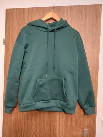 Grüner Kapuzenpulli