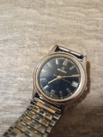 Grovana Swiss Made Armbanduhr – Klassisches Bicolor-Design