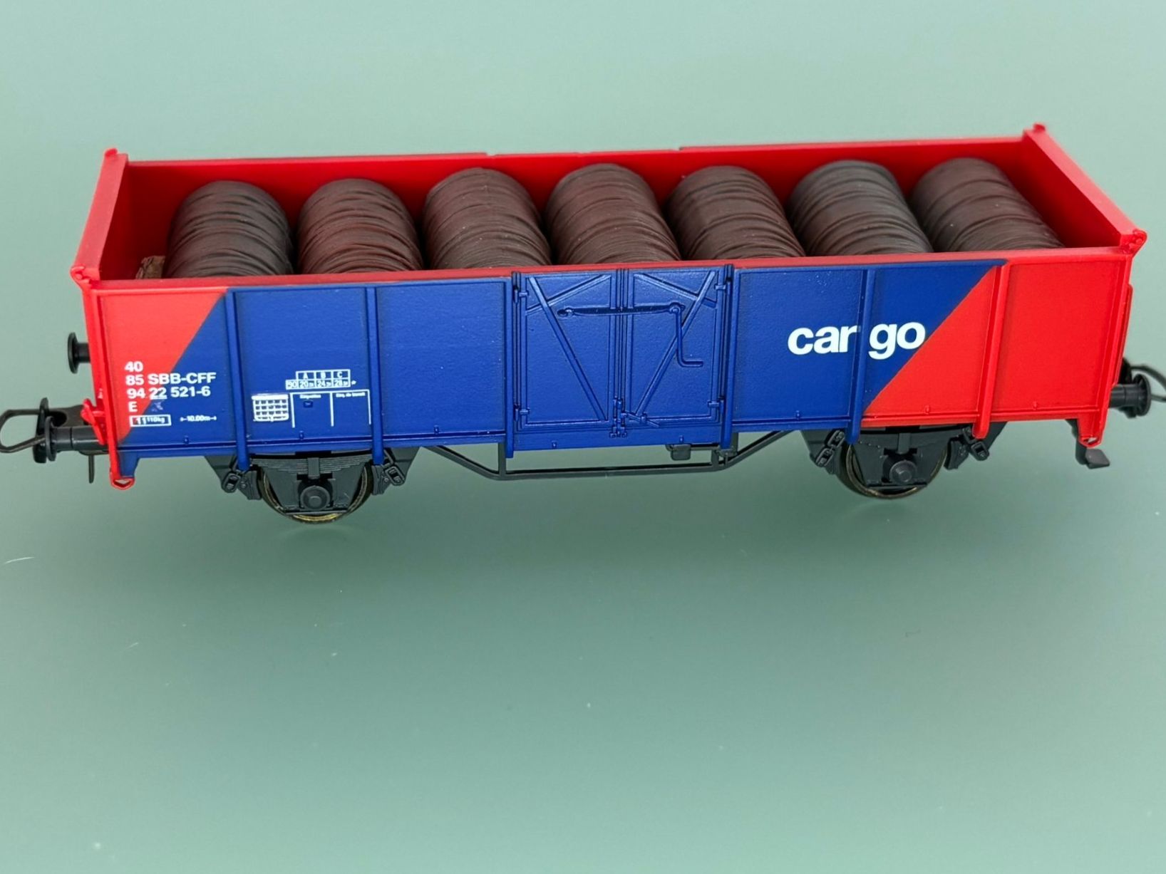 Roco Modellini di ferrovie: SBB CFF CARGO tombereau E chargé avec rouleaux – Usato da SION venduto da Pef12