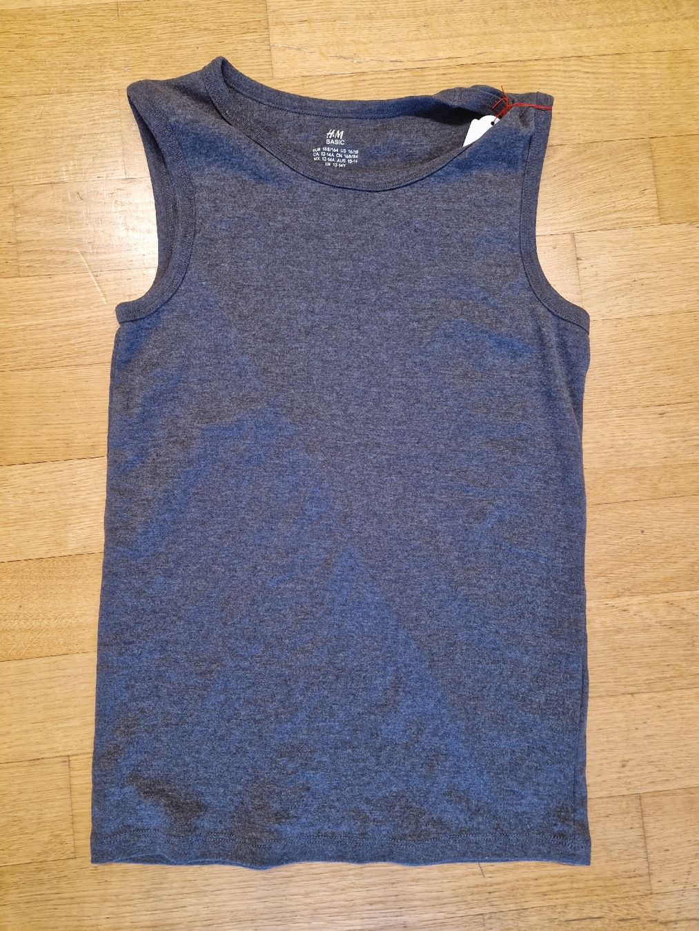 H&M Camicie, T-shirt & Polo: Débardeur H&M Basic Garçon 158/164 cm - État Impeccable – Usato da Penthaz venduto da Sosotroc