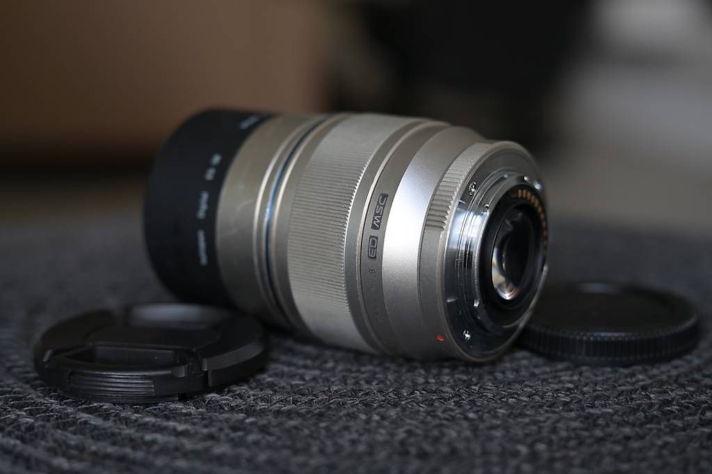 Olympus Obiettivi: Olympus / OM System 75mm f1.8 Objektiv – Usato da Dübendorf venduto da seadart 2