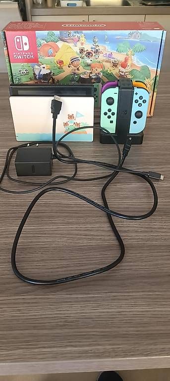 Consoles: Nintendo Switch 1 / Edition Animal Crossing & Accessoires – D'occasion à Petit-Lancy par cinsua 2