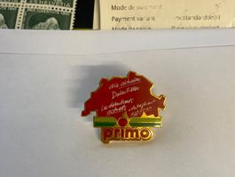 Pin's PRIMO Suisse - Détails actuels - Collection
