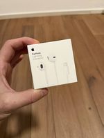 Cuffiette Apple con connettore Lightning
