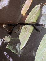 PRADA classic glasses  Colours: silver and black  PRADA