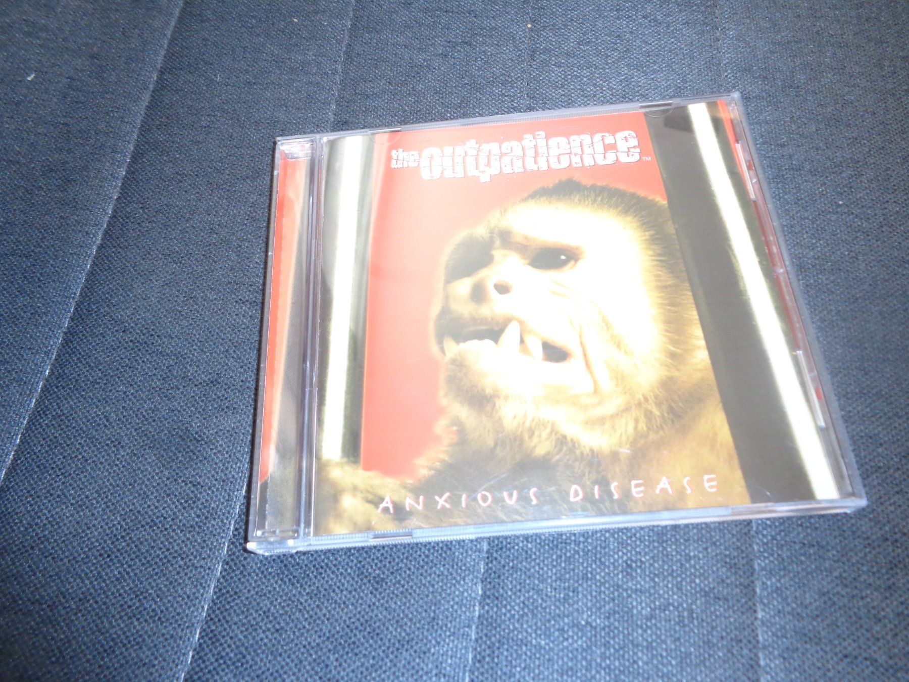 CDs: The Outpatience - Anxious  Disease CD – Gebraucht aus Olten von Disc-Ausverkauf