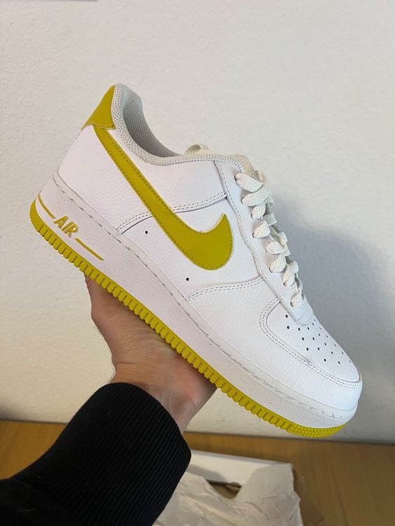 white air force 1 with yellow swoosh