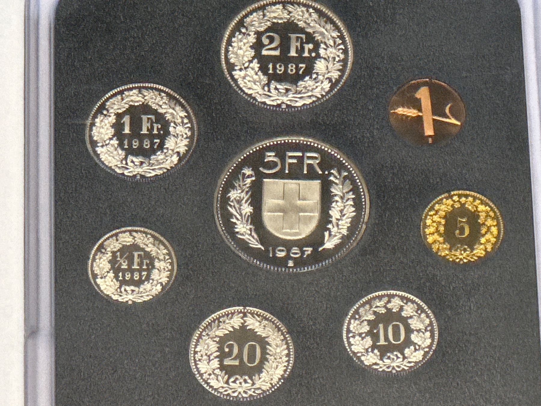 Toutes les monnaies: Schweizer Münzsatz Stgl. 1987 – Neuf avec emballage d'origine à Herisau par herau 3