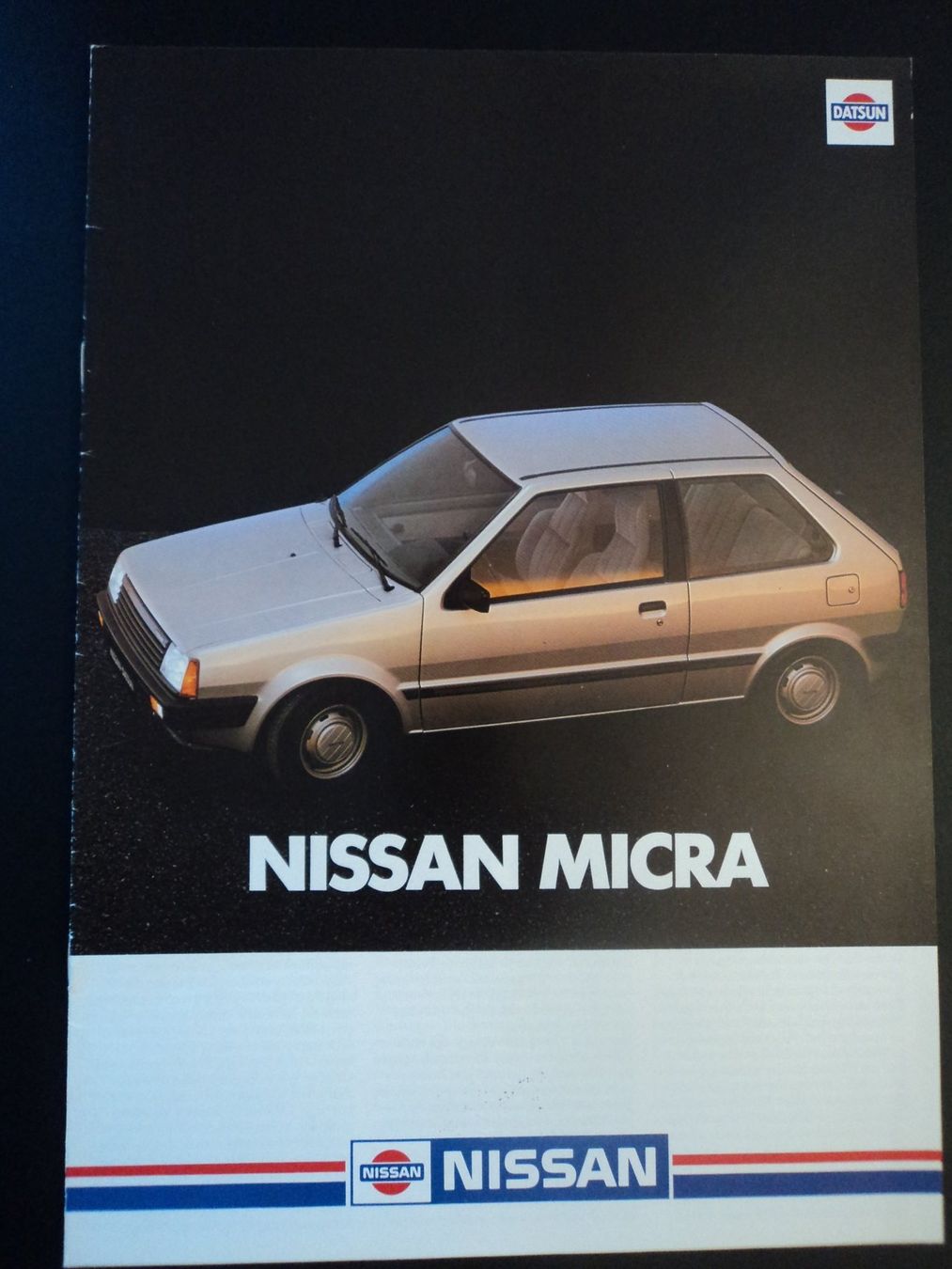 Nissan Documenti: Prospekt Nissan Micra 1983 – Usato da Schwarzenburg venduto da modelCARama