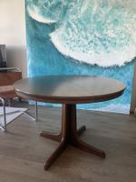 Table ronde en bois de 110cm - 2 rallonges