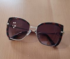 Occhiali da sole Guess Cat-Eye