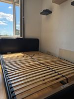 Lit IKEA SLATTUM 140 × 200 cm noir avec sommier – Bon état