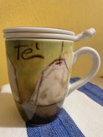 Teetasse mit Sieb und Deckel