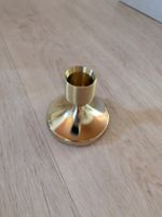 12 goldene Kerzenständer
