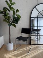 Vintage Design Freischwinger – Chrom & schwarzes Leder