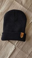 Schwarze Strickmütze