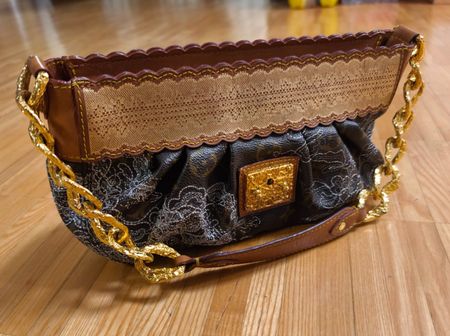 LOUIS VUITTON Kirsten handbag in dentelle monogram canvas