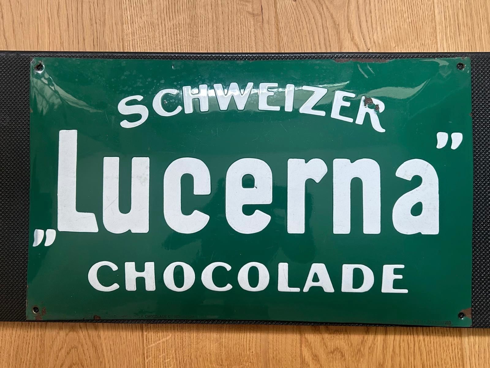 Insegne: **Antikes Emaille Reklameschild Lucerna Chocolade Schweiz** – Usato da Pieterlen venduto da GoOnStage 1