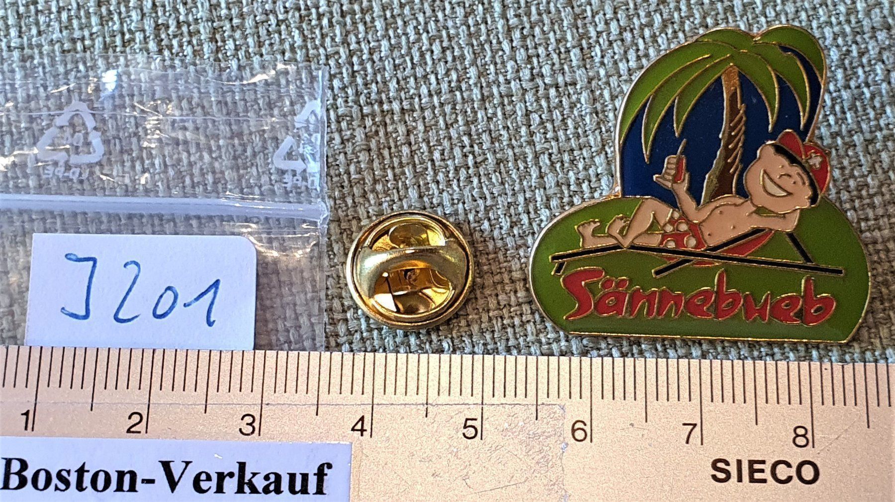 Placchette & Badge: J201 Pin Schweizer Sännebueb Palmeninsel – Usato da Reinach BL venduto da Boston-Verkauf 1