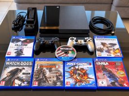 Sony PlayStation 4 Konsole mit zwei Controllern und Spielen 