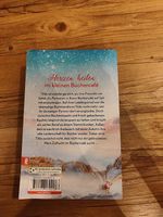 Wintertee im kleinen Büchercafe am Meer / Julia Rogasch