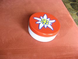 runde, bunte Edelweiss Air Blechdose