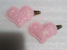 HAARKLIPS;2 heartzen,roserot