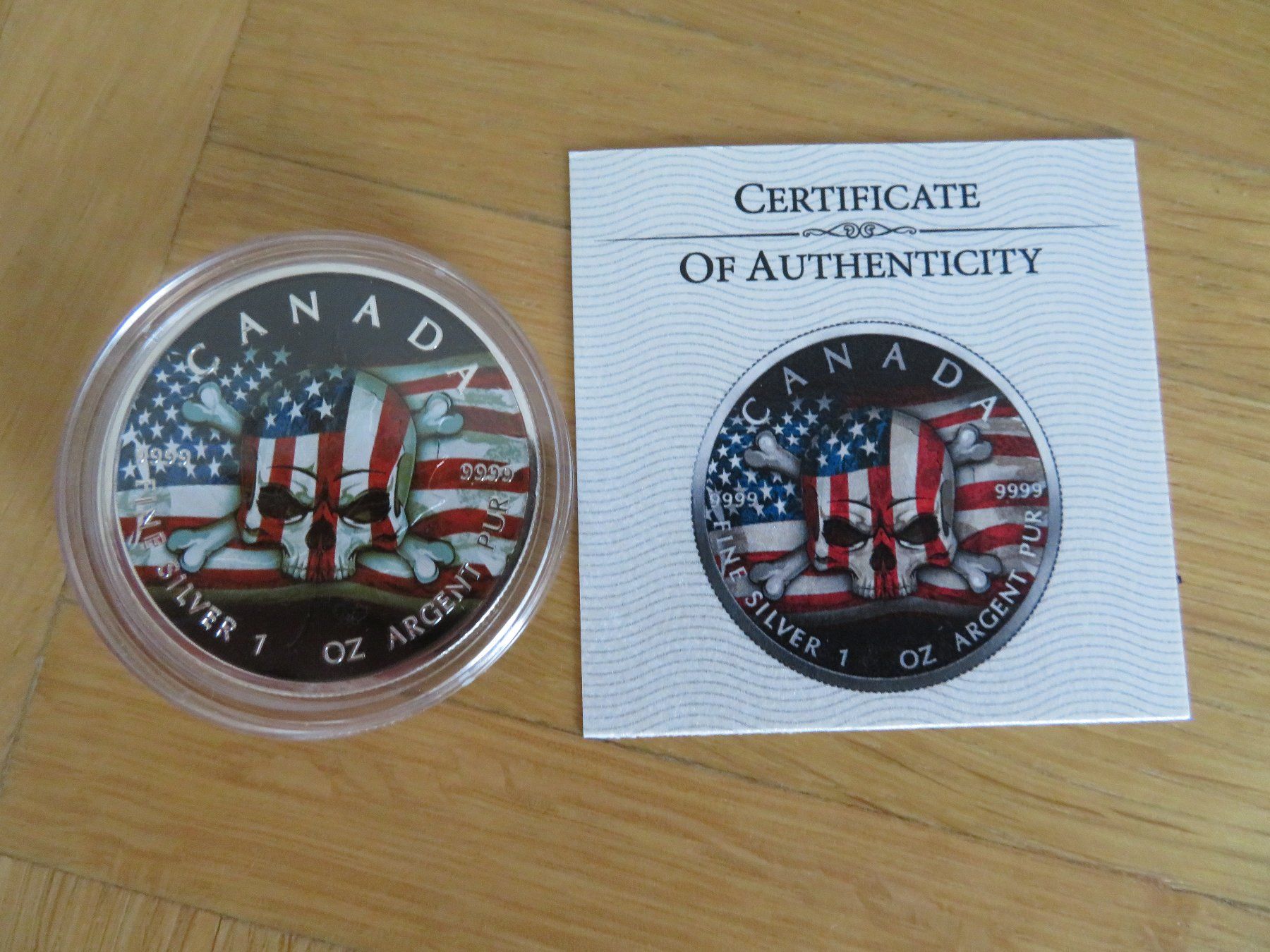 Tutti le monete: US Flag Skull Canada 2022 Maple Leaf 1 OZ SILBER -COLOR EDIT – Nuovo e nell'imballaggio originale da Wetzikon ZH venduto da Nicki6 2
