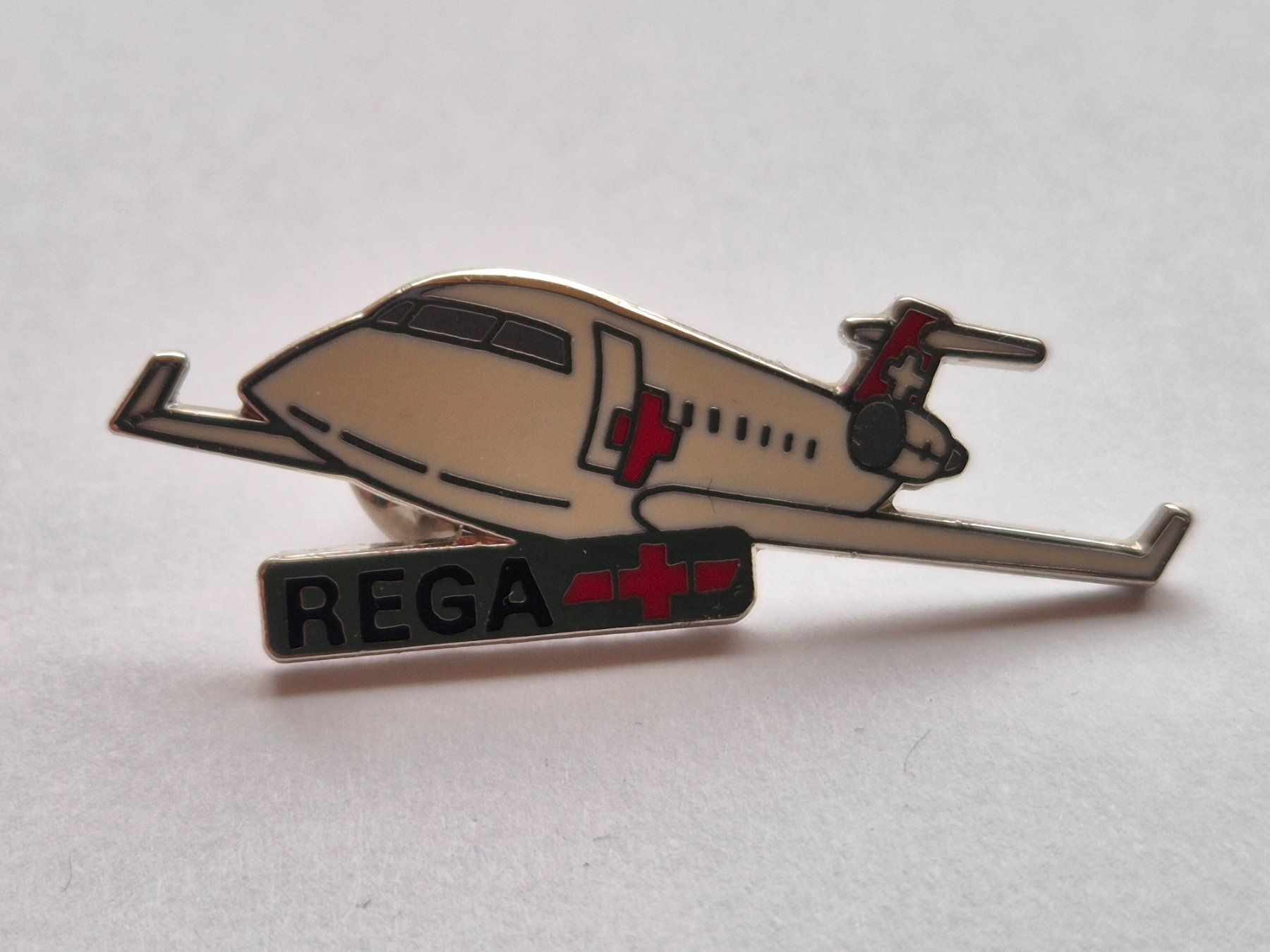 Rega Placchette & Badge: REGA  FLUGZEUG   -     Pin – Usato da Niederweningen venduto da Obson