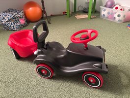Rutschauto mit Anhänger schwarz-rot guter Zustand
