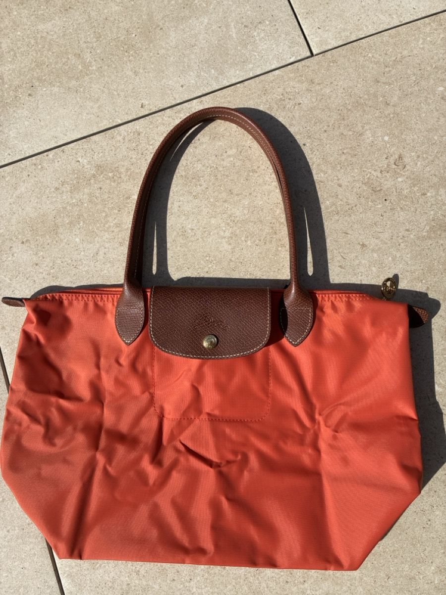 Longchamp Borse da donna: Handtasche Longchamp Le Pliage orange gebraucht – Usato da Bettlach venduto da Brissoni 2