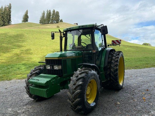 John Deere Trattori: John Deere 6400 – Usato da Oberhofen Thun'see venduto da Tranchet-Trading