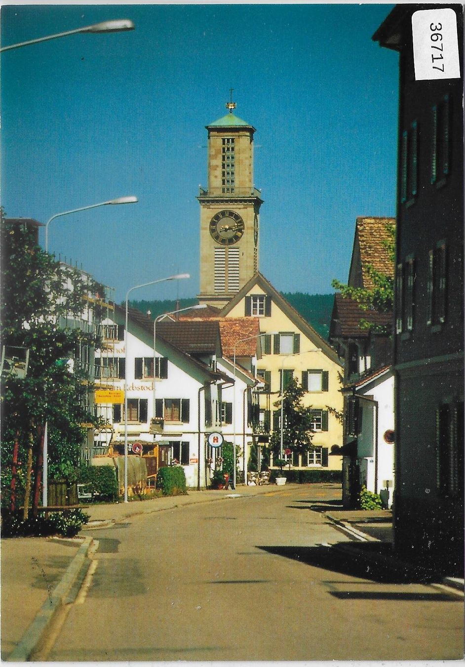 Cartoline postali: Dorfstrasse mit ref. Kirche - Thalwil – Usato da Ettingen venduto da Kartenplanet