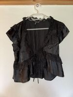 Schwarze Bluse mit Spitze