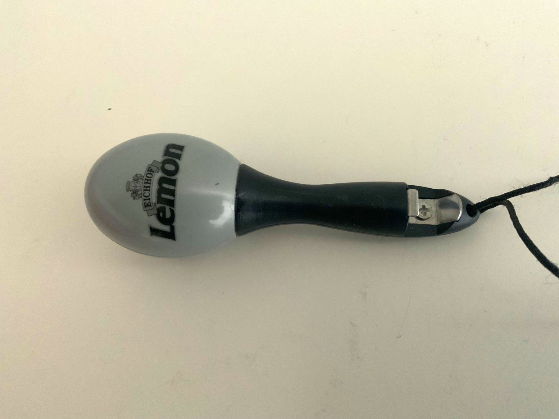 Eichhof Portachiavi: Rassel mit Flaschenöffner Gadget Werbung Eichhof Lemon – Usato da Luzern venduto da Flocke11 2