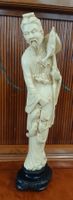 Asiatika - Figur mit Fischen