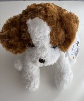 Peluche chien assis