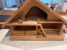 Holzstall mit viele Tiere