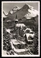 AK Arosa, Dorfkirche gegen die Berge